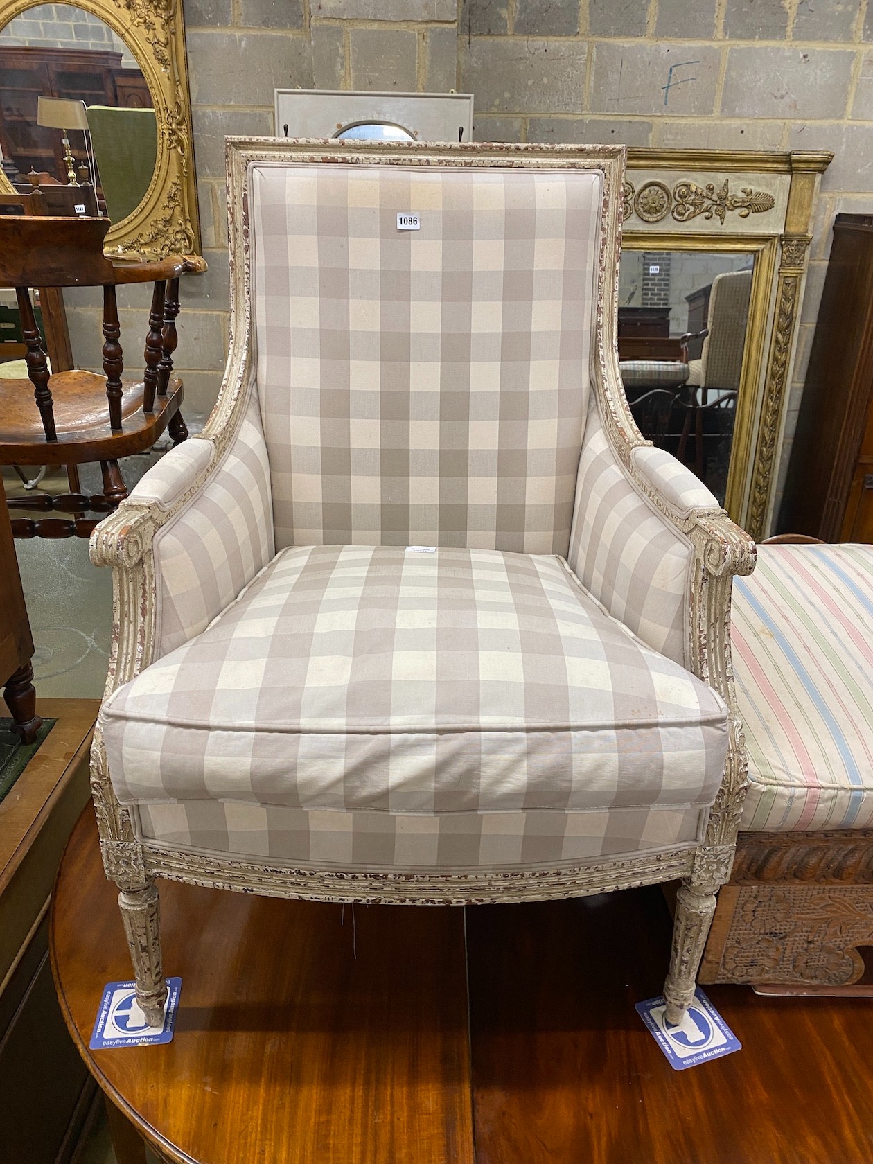 A Louis XVI style painted beech upholstered armchair, width 66cm, depth 64cm, height 99cm